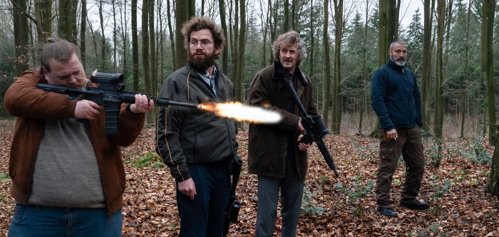 Mads Mikkelsen and his group of math nerds fire assault rifles in the forest in Riders of Justice