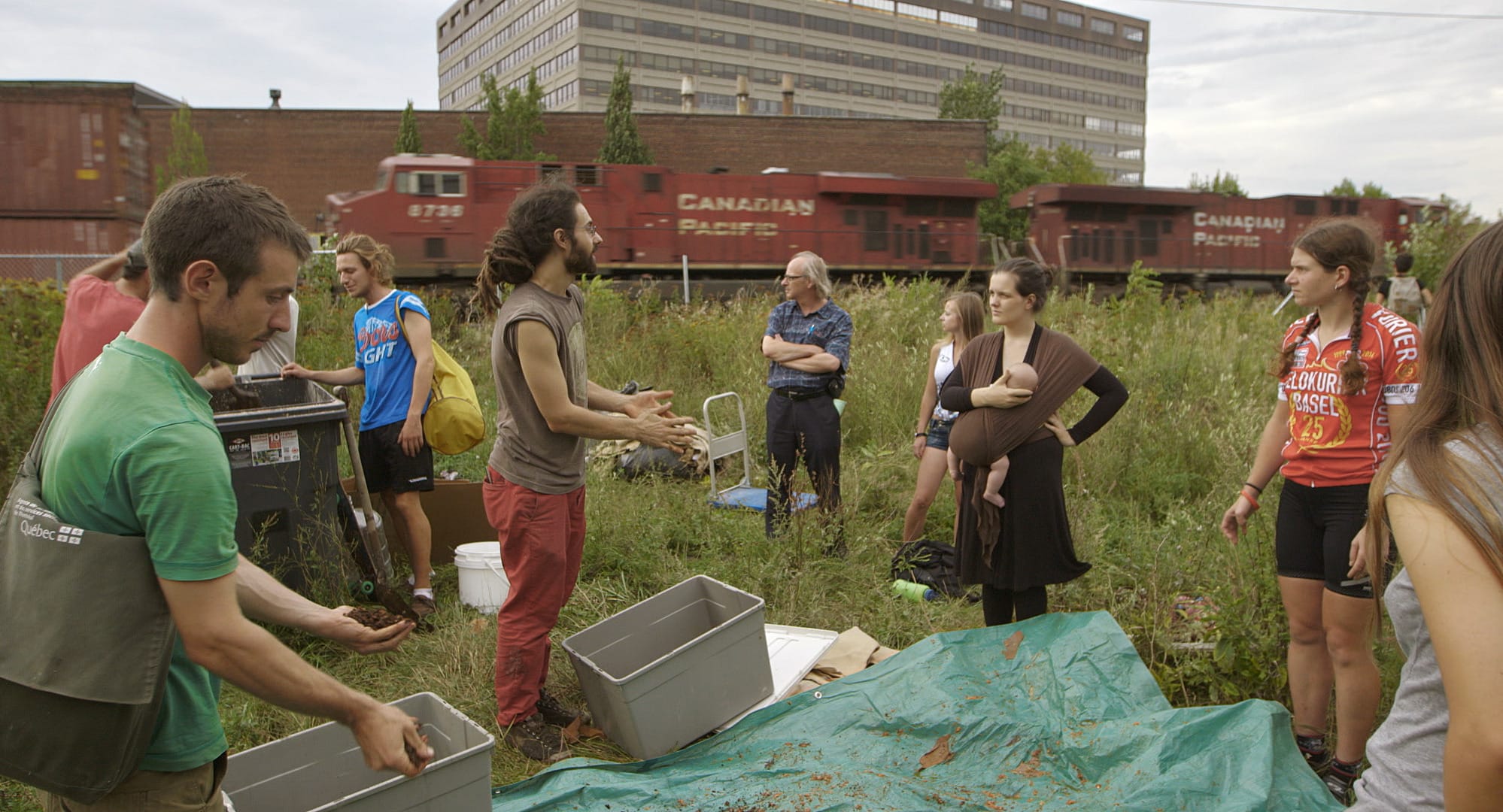 A group of mushroom enthusiasts out in a field in The Mushroom Speaks