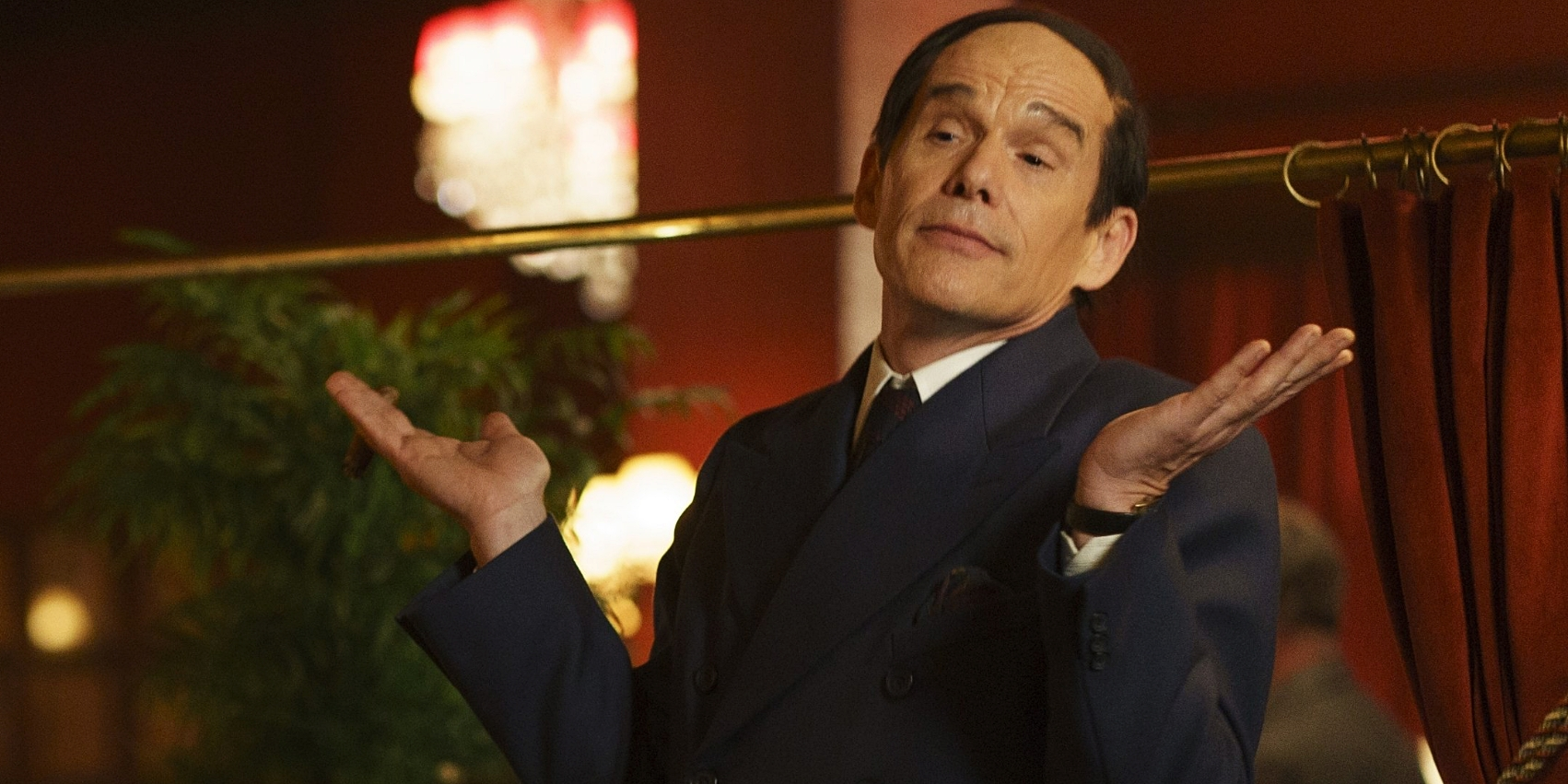 Ethan Hawke gives a sassy shrug as Lorenz Hart in Blue Moon