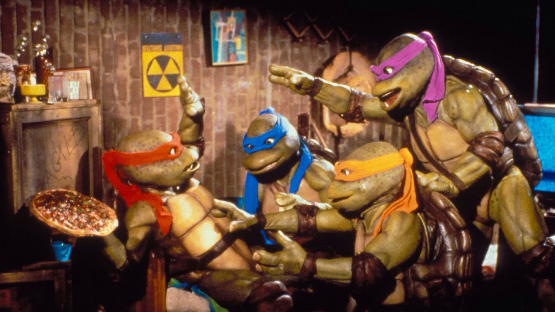 Those rapscallion Teenage Mutant Ninja Turtles up to pizza-related hijinks in Teenage Mutant Ninja Turtles II: The Secret of the Ooze