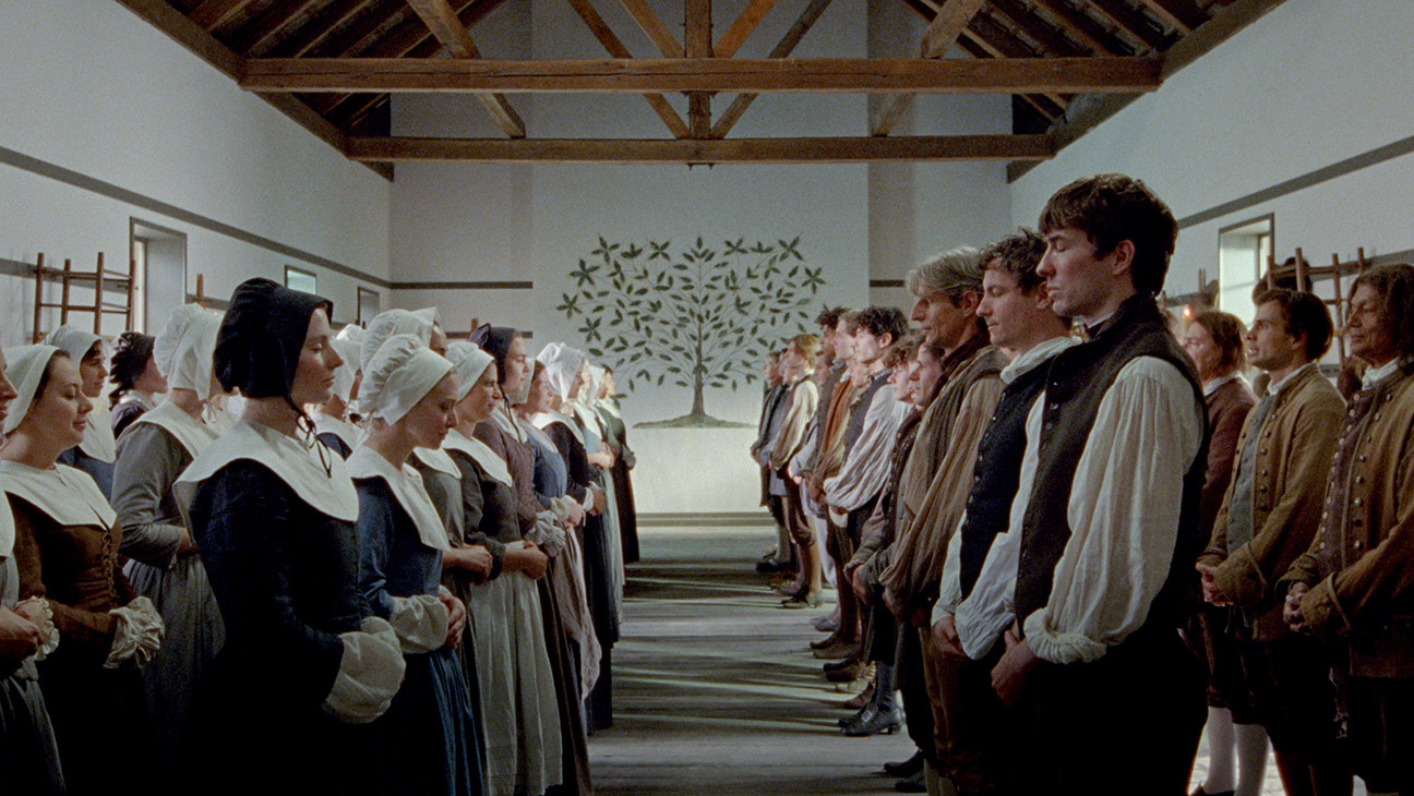 In the Testament of Ann Lee, the Shakers line up across from each other, segregated by gender, and close their eyes