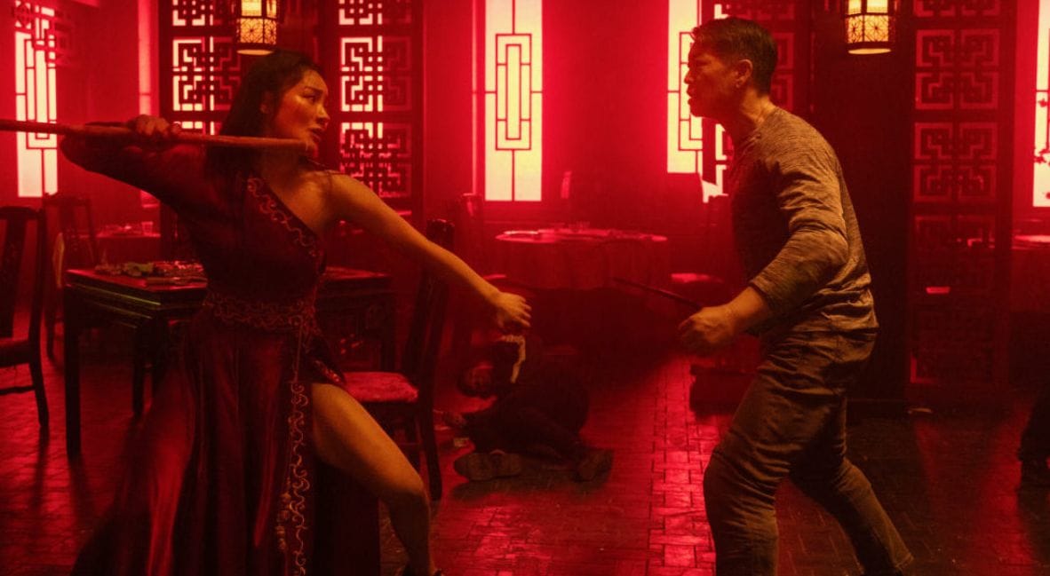 Liu Yaxi winding up to decimate some fool in a red-tinted restaurant in The Forbidden City