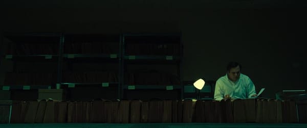 Mark Ruffalo makes his way through a pile of paperwork in Dark Waters
