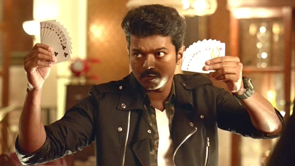 In Mersal, Vijay holds up playing cards in both hands