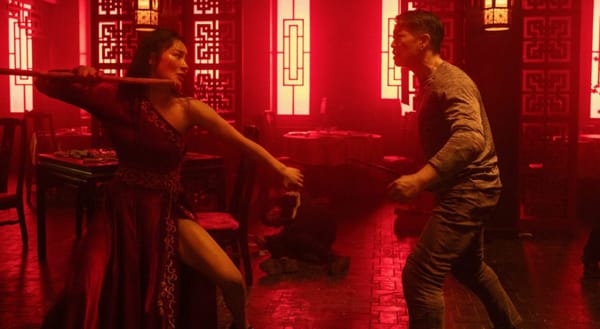Liu Yaxi winding up to decimate some fool in a red-tinted restaurant in The Forbidden City